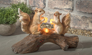 Solar Squirrel On Log Ornament